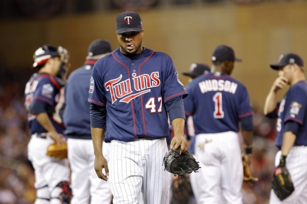 Minnesota Twins starting pitcher Francisco Liriano leaves the mound after he is pulled from the game against Toronto