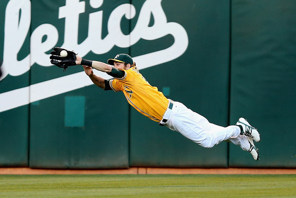 Josh Reddick catch (courtesy of Ezra Shaw Getty Images, via Zimbio)
