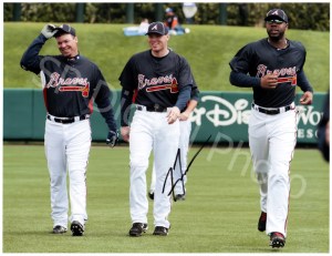 Chipper Jones, seen here mentoring Jason Heyward and Freddie Freeman, was at the tail end of the 14 straight NL East Division Titles for this given contract. He was the premiere switch hitting slugger in the MLB, and his all around game helped the Braves dominate the NL East
