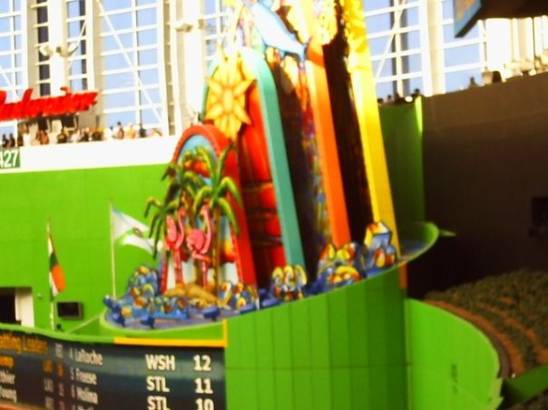 The HR contraption that is the CF wall in MIA. Could the club be relaying signals from opposing catchers by having the fish illuminate during play at New Marlins Ball Park. "Oh Bull Durham" on that.