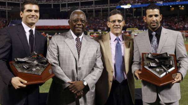 Jose Bautista with fellow Hank Aaron Award winner Joey Votto in 2010. In 2010 Bautista became the 26th player to ever hit 50+ HRs in a single season, eclipsing the mark with 54.