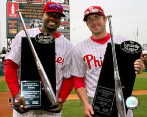 Howard and Utley are a powerful tandem. Howard currently has 300 career HRs, while Utley sits just 1 shy of 200 at 199. Both also have a career Slugging% of .500 or better. This pic is from 2006 when they each brought a Silver Slugger Award back to Philly.