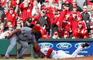 Ryan Ludwick awkwardly sliding into third base on passed ball by Jared Weaver. Ludwick ultimately had to be removed from the game.