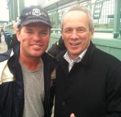 Chuck Booth and Larry Lucchino talk baseball in the RF reserved seats at Fenway