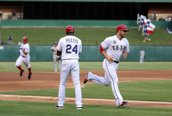 Adam Rosales, seen here rounding behind 3rd, is not known for much of a power threat, yet he tallied 2 long bombs earlier this week in a game. I was surprised to see the Journeyman INF has knocked 23 HRs in 859 AB. His 3 slash line for his lifetime is still only .226/.298/.348 in that time frame however, his output would equate to about 18 - 22 HRs for a full year.