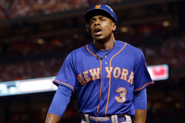 New York Mets' Curtis Granderson heads back to the dugout after striking out during the sixth inning of a baseball game against the St. Louis Cardinals, Friday, July 17, 2015, in St. Louis. (AP Photo/Jeff Roberson)