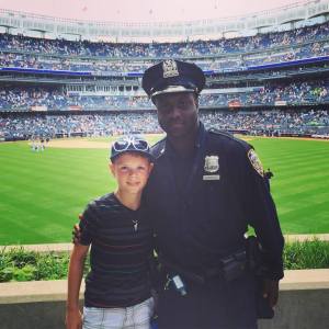 My Nephew Jake made a friend at the game.  He wants to be a police officer if he is not a hockey player first.