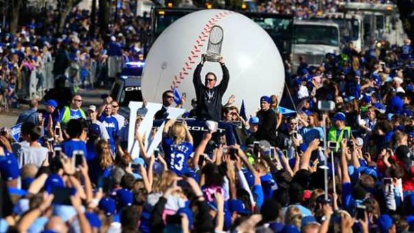 kansas-city-royals-manager-ned-yost-holds-the-world-series-trophy-during-a-victory-parade-in-kansas-city