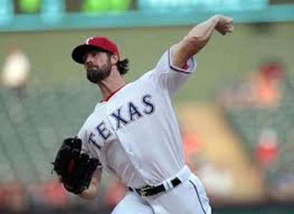 Cole Hamels was picked up at the Trade Deadline by the Rangers in 2015. He fashioned a 7 - 1 record with a 3.66 ERA and a WHIP of 1.191. This move was a perfect idea with the club's pending loss of Yovani Gallardo, coupled with the uncertainty of staff ace Yu Darvish coming back in time for the 2016 season from Tommy John Surgery. Including a subsidized stipend of $8.5 MIL from Philly this year, the LHP will earn just around $84 MIL over the next four years with the club. His playoff battled arm was put to the test again in the 2015 ALDS. He pitched to a 2.70 ERA in 2 Game Starts. Hamels can lead a rotation into a postseason.